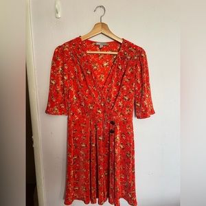 ASOS DESIGN Petite ditsy print plisse mini dress with button detail